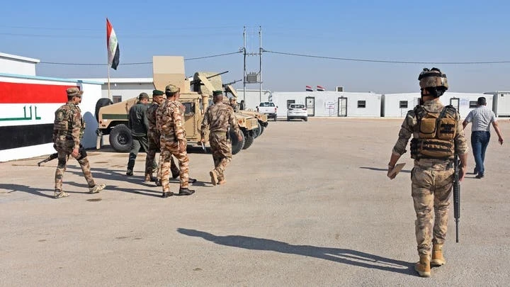 العراق يمنع ضباط من نظام الأسد من مغادرة معسكر شمال بغداد