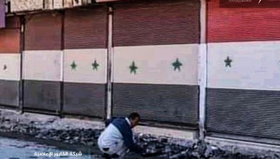 بالصور.. ميليشيا "الدفاع الوطني" تستولي على 5 محال تجارية في الرقة