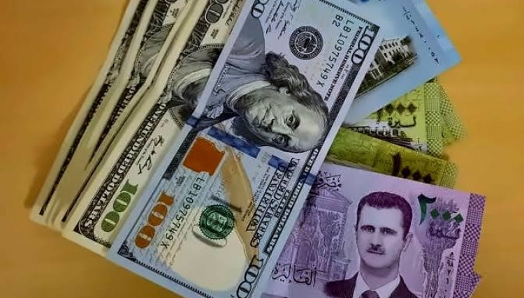 تراجع في سعر صرف الليرة السورية أمام الدولار